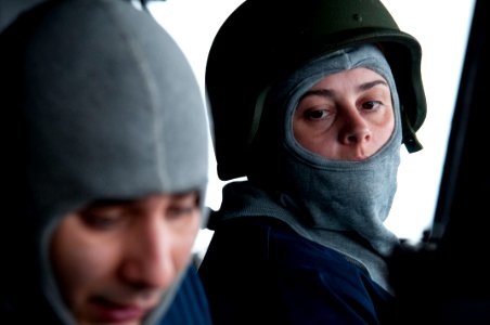 US Navy 091024-N-5319A-011 Lt. Amy Heck takes her watch on the bridge of the amphibious assault ship USS Nassau (LHA 4) during a general quarters drill