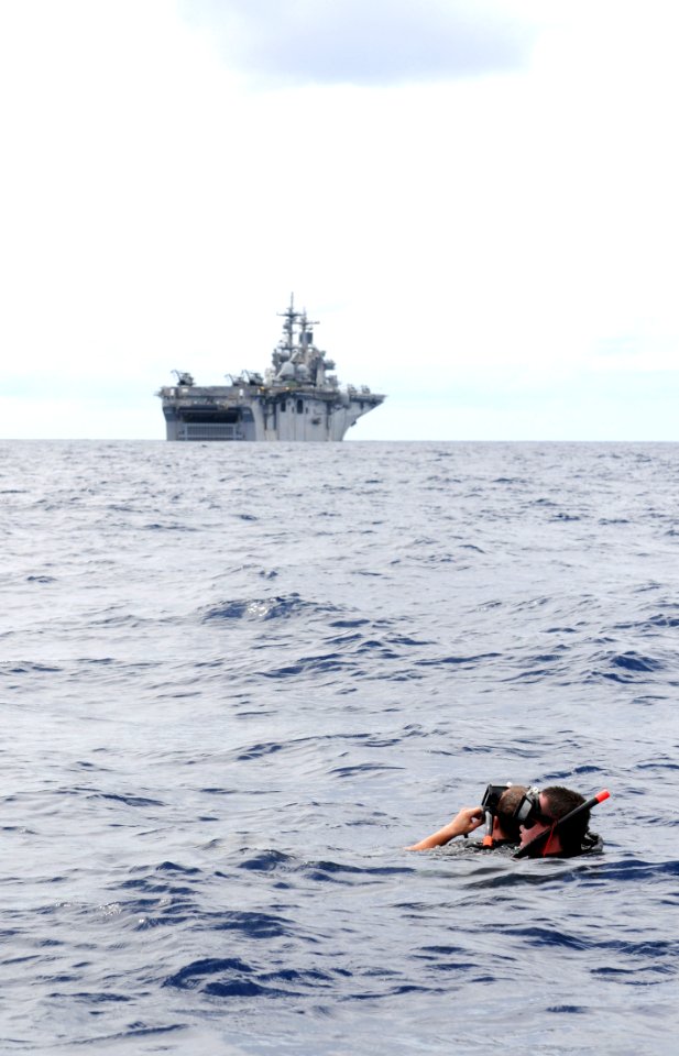 US Navy 091023-N-0890S-171 Search and rescue swimmers Seaman Corbin Laudenslager, right, from Caroline County, Va., and Aviation Ordnanceman 2nd Class Zachery Bernat, from Punxsutawney. Pa., conduct search and rescue training e