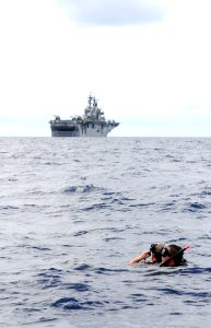 US Navy 091023-N-0890S-171 Search and rescue swimmers Seaman Corbin Laudenslager, right, from Caroline County, Va., and Aviation Ordnanceman 2nd Class Zachery Bernat, from Punxsutawney. Pa., conduct search and rescue training e