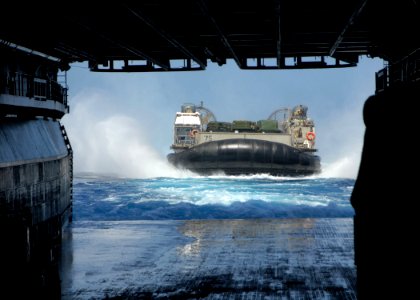US Navy 091022-N-8607R-044 A landing craft, air cushion (LCAC) prepares to enter the well deck of the amphibious assault ship USS Bonhomme Richard (LHD 6) photo