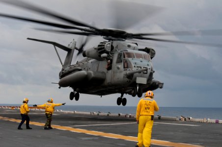 US Navy 091026-N-5319A-028 An MH-53E Sea Dragon helicopter lifts off from the flight deck of the amphibious assault ship USS Nassau (LHA 4) during a Composite Unit Training Exercise