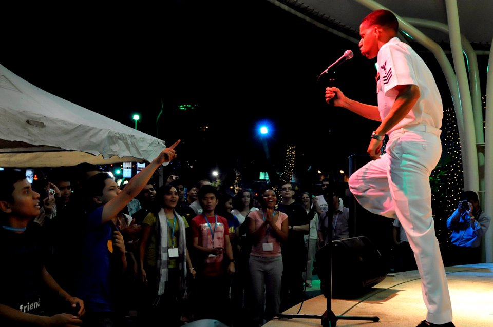 US Navy 091026-N-7478G-486 Musician 1st Class Christopher Sams, assigned to the amphibious command ship USS Blue Ridge (LCC 19), sings