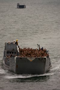 US Navy 091028-N-5319A-250 Marines from the 24th Marine Expeditionary Unit (24th MEU) are transported by Landing Craft Unit 1645 (LCU 1645) to the amphibious assault ship USS Nassau (LHA 4)