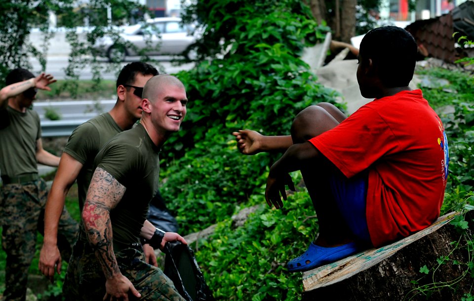US Navy 091027-N-7280V-790 Marines assigned to Fleet Anti-terrorism Security Team Pacific (FASTPAC) Company, 5th Platoon, help clean at Agathians Children's Home during a community service project