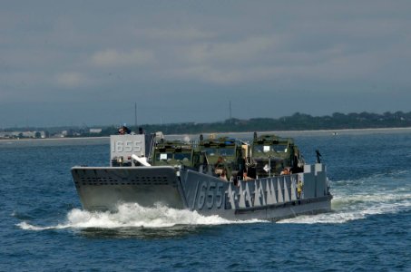 US Navy 091027-N-3592S-198 Landing Craft Utility 1655 (LCU 1655) transports equipment for the combat logistics battalion of the 24th Marine Expeditionary Unit (24th MEU) from Camp Lejeune, N.C. to the amphibious assault ship US