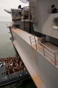 US Navy 091028-N-5319A-263 Marines from the 24th Marine Expeditionary Unit (24th MEU) are transported by Landing Craft Unit 1655 (LCU 1655) into the well deck of the amphibious assault ship USS Nassau (LHA 4)