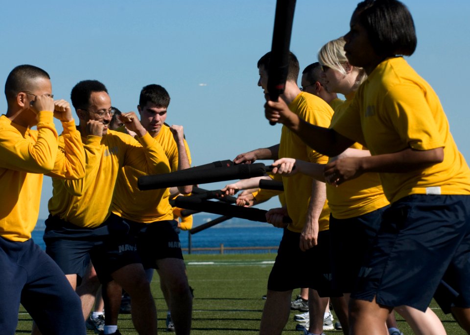 US Navy 091027-N-5253W-019 Students attending the Fleet Activities Yokosuka Auxiliary Security Force Academy practice defensive techniques during a training session