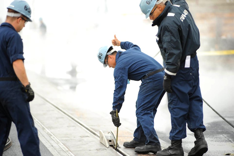 US Navy 091028-N-5082X-001 Sailors aboard the aircraft carrier USS Enterprise (CVN 65) prepare catapult three for no-load testing