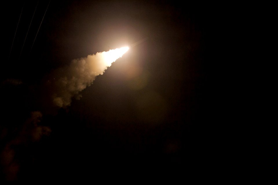 USS Arleigh Burke launches tomahawk missiles 140923-N-WD757-282