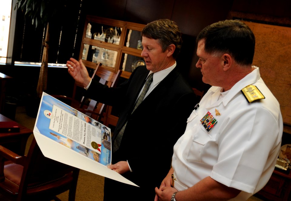 US Navy 091027-N-5208T-003 Harris County Judge Ed Emmett presents a Navy Week proclamation to Rear Adm. W. Mark Skinner, program executive officer for Tactical Aircraft Programs