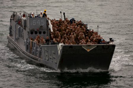 US Navy 091028-N-5319A-252 Marines from the 24th Marine Expeditionary Unit (24th MEU) are transported by Landing Craft Unit 1645 (LCU 1645) to the amphibious assault ship USS Nassau (LHA 4)