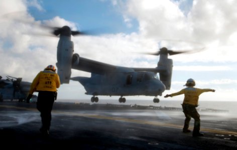 US Navy 091101-N-5319A-072 Landing signalmen launch an MV-22 Osprey assigned to the Golden Eagles of Marine Medium Tiltrotor Squadron (VMM) 162 from the amphibious assault ship USS Nassau (LHA 4)