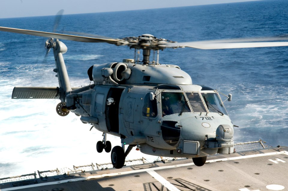 US Navy 091031-N-1251W-039 An SH-60B Seahawk helicopter assigned to Helicopter Anti-Submarine Squadron Light (HSL) 51 approaches the guided-missile destroyer USS Lassen (DDG 82) during deck landing qualifications