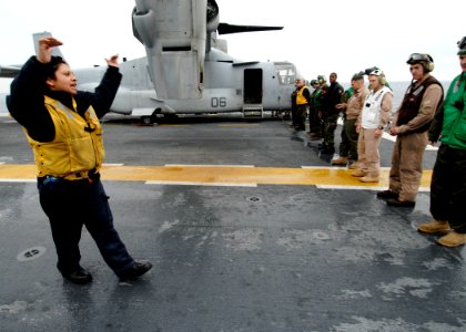 US Navy 091102-N-6439C-010 Air Department personnel conduct a foreign object debris walk down before flight operations aboard the amphibious assault ship USS Nassau (LHA 4)