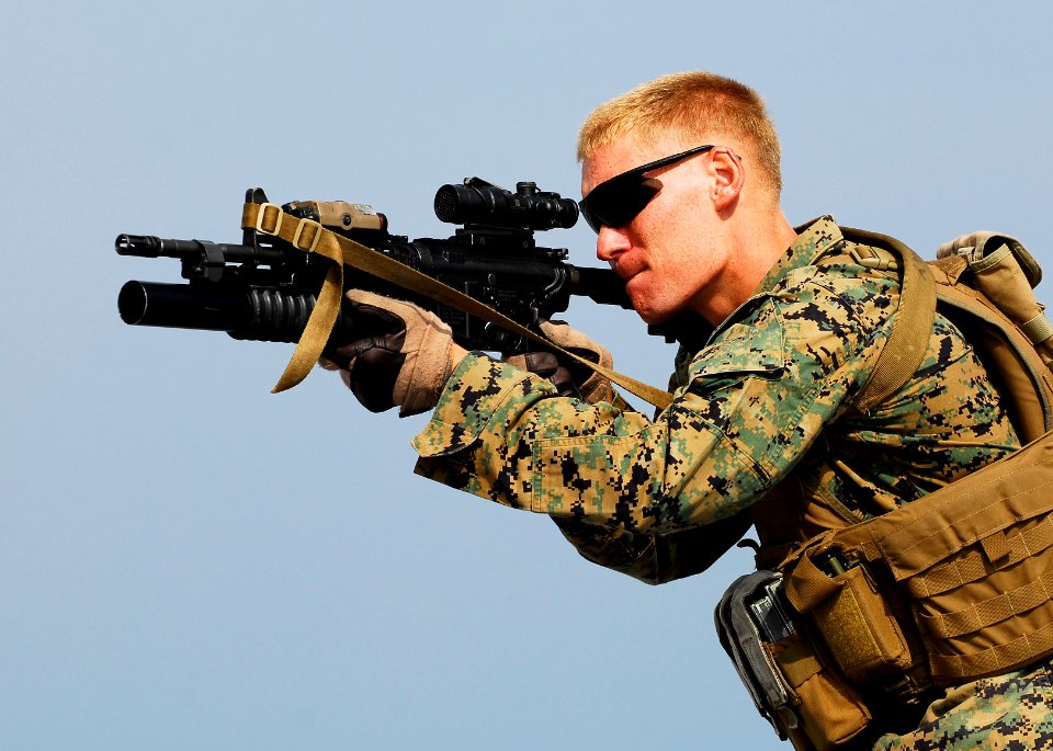 US Navy 091029-N-0807W-107 A Marine assigned to Battalion Landing Team 2-5, 31st Marine Expeditionary Unit (31st MEU) participates in an enhanced marksmanship program shoot aboard the amphibious dock landing ship USS Harpers Fe