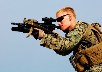 US Navy 091029-N-0807W-107 A Marine assigned to Battalion Landing Team 2-5, 31st Marine Expeditionary Unit (31st MEU) participates in an enhanced marksmanship program shoot aboard the amphibious dock landing ship USS Harpers Fe