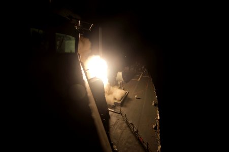 USS Arleigh Burke launches tomahawk missiles 140923-N-WD757-347