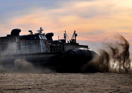 US Navy 091104-N-0807W-197 Landing Craft Air Cushion 57 transports U.S. Marine equipment from the amphibious dock landing ship USS Harpers Ferry (LSD 49) photo