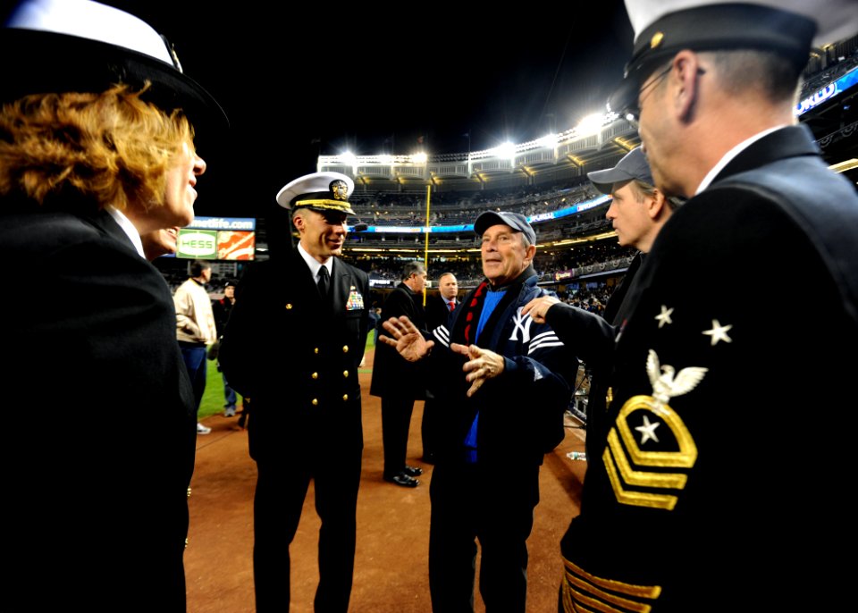 US Navy 091104-N-2147L-004 New York City Mayor Michael Bloomberg greets Cmdr. Curt Jones, commanding officer of the amphibious transport dock ship Pre-Commissioning Unit (PCU) New York (LPD 21)