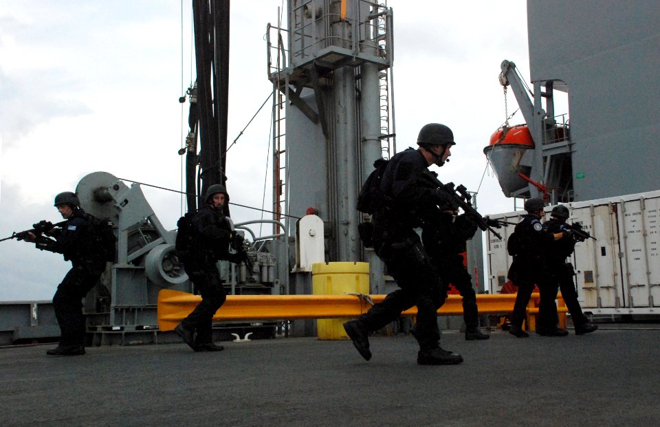 US Navy 091029-N-7095C-026 Members of a combined boarding team participate in a training exercise aboard the Military Sealift Command fleet replenishment oiler USNS Walter S. Diehl (T-AO 193)