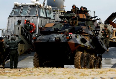 US Navy 091104-N-0807W-159 Marines assigned to the 31st Marine Expeditionary Unit (31st MEU) unload assault vehicles from a landing craft, air cushion from the amphibious dock landing ship USS Harpers Ferry (LSD 49)