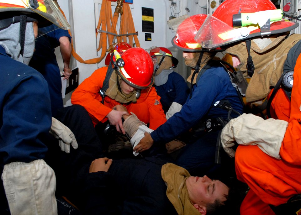 US Navy 091031-N-6692A-014 A medical team aboard the amphibious dock landing ship USS Tortuga (LSD 46) treats a simulated injury during a general quarters drill