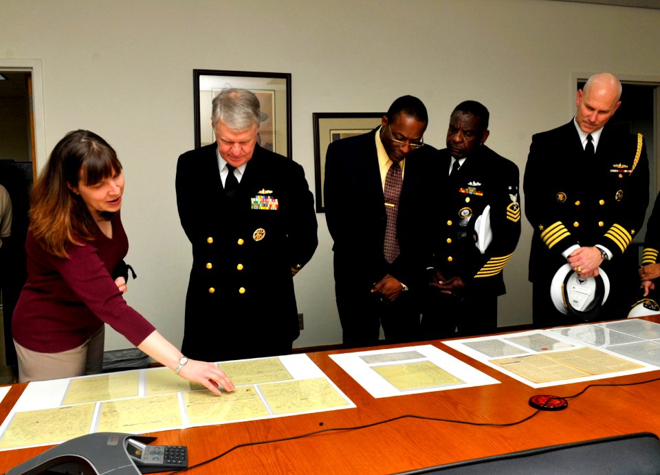 US Navy 091104-N-8273J-164 Chief of Naval Operations Adm. Gary Roughead views a selection of typed and handwritten manuscripts from Dr. Martin Luther King Jr