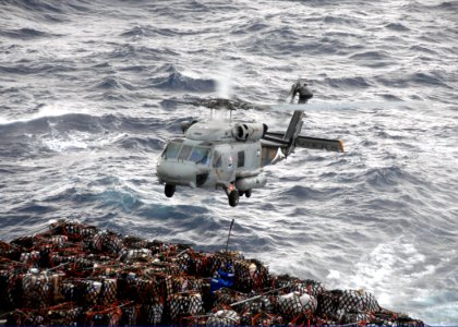 US Navy 091105-N-1644H-093 Crew members aboard the Military Sealift Command fleet replenishment oiler USNS Rappahannock (T-AO 204)