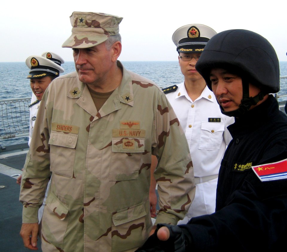 US Navy 091101-N-5184K-004 Rear Adm. Scott Sanders, commander of Combined Task Force (CTF) 151 speaks with junior officers aboard the People's Liberation Army Navy frigate Zhoushan (FFG 537)