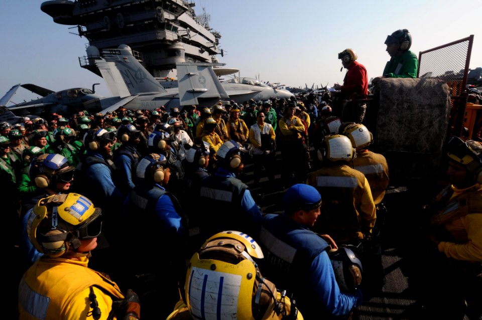 US Navy 091104-N-3038W-062 Sailors aboard the aircraft carrier USS Nimitz (CVN 68) attend a safety brief prior to flight deck drills