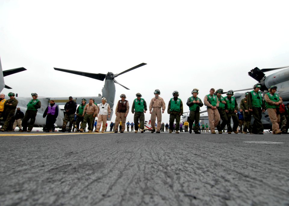 US Navy 091102-N-6439C-016 Air Department personnel conduct a foreign object debris walk down before flight operations aboard the amphibious assault ship USS Nassau (LHA 4)