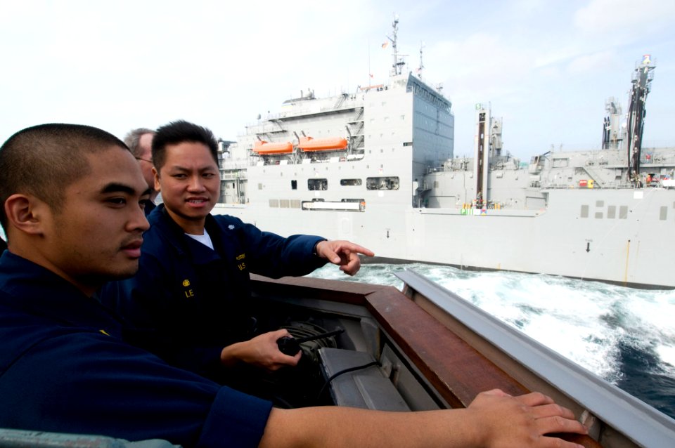 US Navy 091106-N-1251W-034 Cmdr. H. B. Le, commanding officer of the guided-missile destroyer USS Lassen (DDG 82),