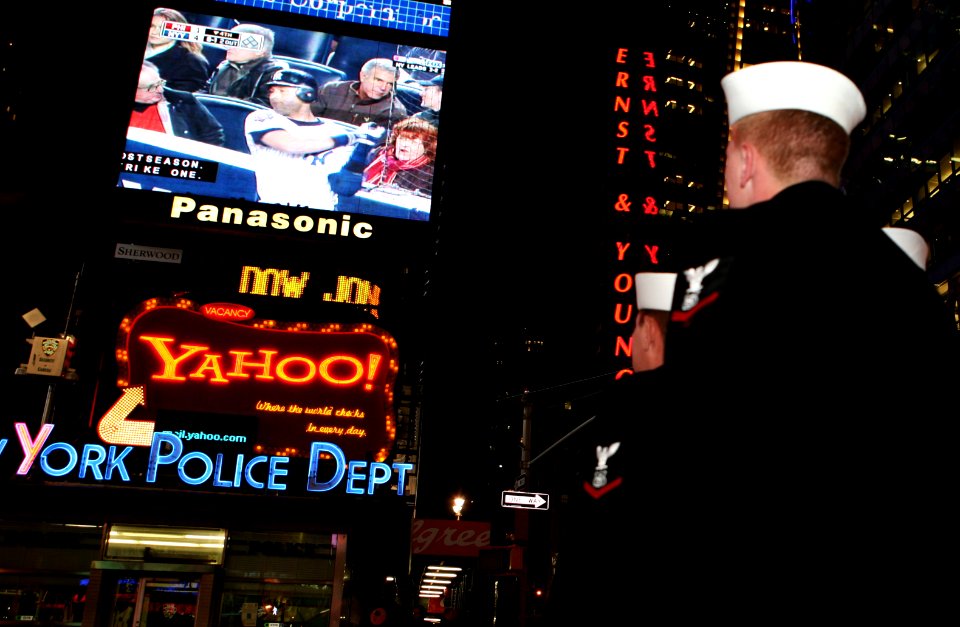 US Navy 091104-N-4936C-001 Sailors assigned to the amphibious transport dock ship Pre-Commissioning Unit (PCU) New York (LPD 21), watch game six of the World Series in Times Square