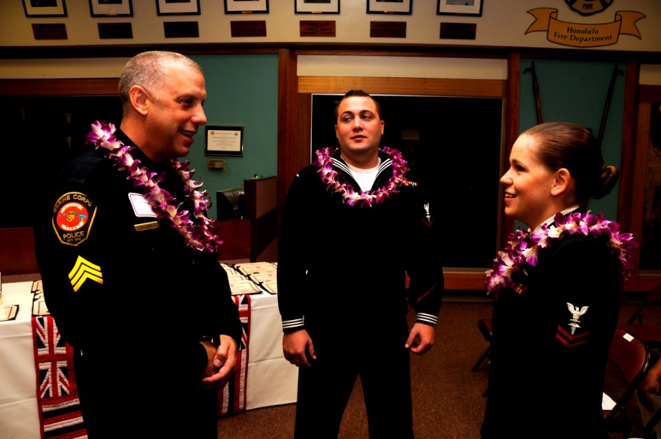 US Navy 091104-N-7498L-012 Marine Sgt. David Alexander, left, assigned to the Marine Corps Police Department, Kaneohe Bay, Hospital Corpsman 3rd Class Wyatt Timmons