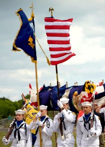 US Navy 091107-N-8689C-028 Members of the Melbourne Sea Cadet Color Guard retire the colors during the 2009 Veteran's Day Ceremony and Muster XXIV at the National Navy UDT-SEAL Museum in Fort Pierce, Fla