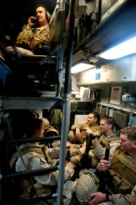 US Navy 091105-N-5319A-040 Marines from the 24th Marine Expeditionary Unit (24th MEU) prepare to disembark from the well deck of the amphibious assault ship USS Nassau (LHA 4) on a landing craft air cushion (LCAC)