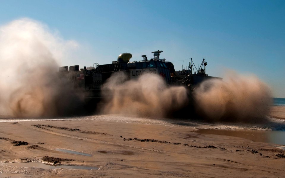 US Navy 091105-N-5319A-125 A landing craft air cushion (LCAC) from Assault Craft Unit (ACU) 4, embarked aboard the amphibious assault ship USS Nassau (LHA 4), approaches a beach at Camp Lejuene N.C