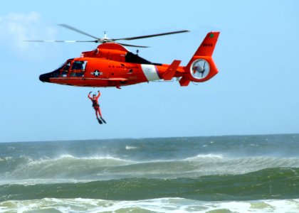 US Navy 091108-N-5812W-004 The U.S. Coast Guard demonstrates how they conduct a search and rescue during the 2009 Sea and Sky Spectacular photo