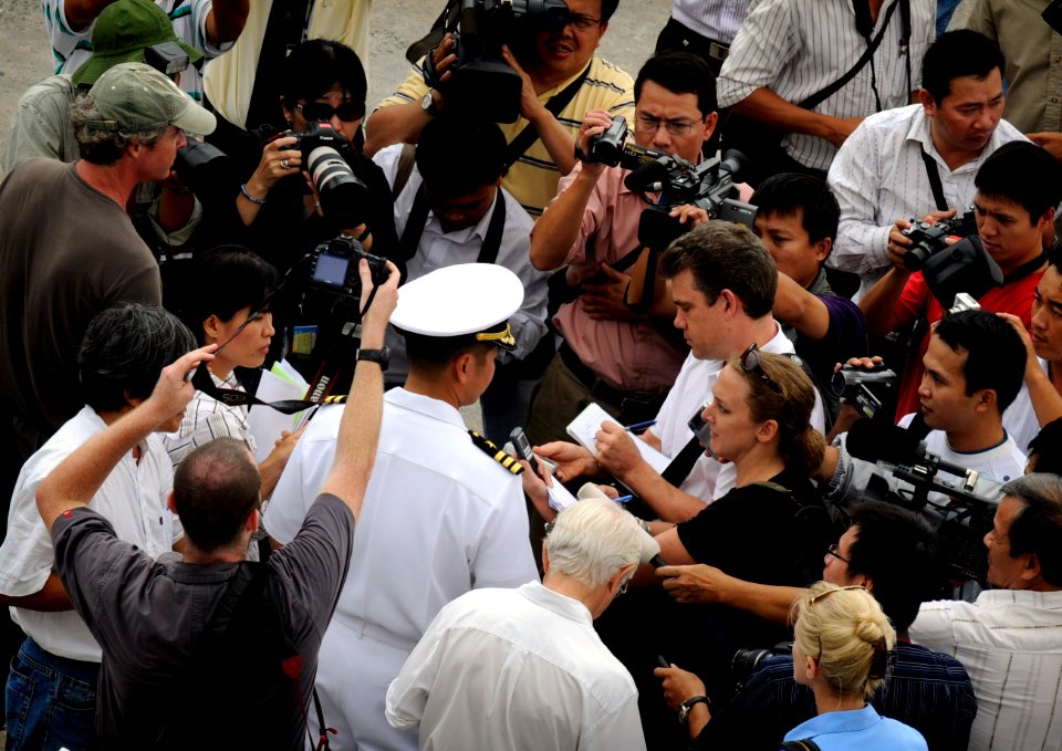 US Navy 091107-N-3830J-039 Cmdr. H. B. Le, commanding officer of the Arleigh Burke-class destroyer USS Lassen (DDG 52), talks to the press during a port visit in Da Nang