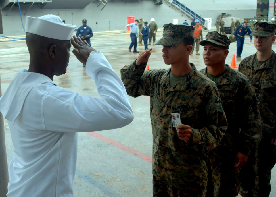 US Navy 091110-N-5215E-105 eaman Justin Michell admits Marines assigned to the 31st Marine Expeditionary Unit (31st MEU)