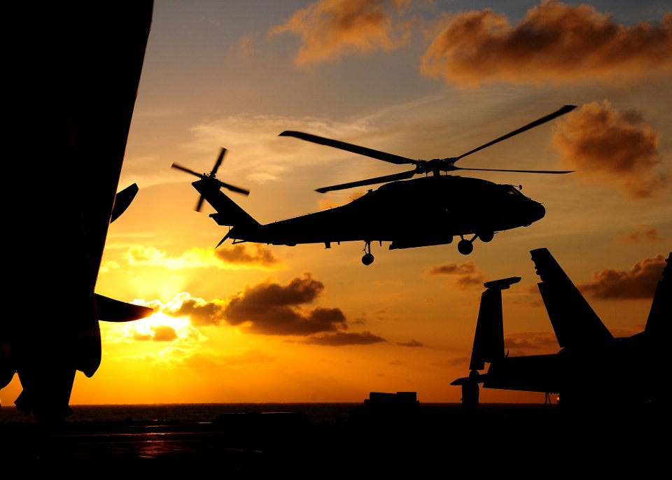 US Navy 091112-N-6233H-019 An SH-60F Sea Hawk helicopter from the Chargers of Helicopter Anti-Submarine Squadron (HS) 14 lifts off the flight deck of aircraft carrier USS George Washington (CVN 73)