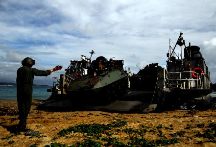 US Navy 091108-N-0807W-182 Marines assigned to the 31st Marine Expeditionary Unit (31st MEU) unload assault vehicles from a landing craft, air cushion from the amphibious dock landing ship USS Harpers Ferry (LSD 49) photo