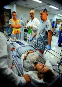 US Navy 091110-N-7032B-072 Lt. j.g. Chantal K. Dickinson is treated by Naval Medical Center San Diego staff during a command-wide mass casualty drill