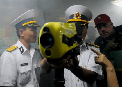 US Navy 091109-N-3830J-218 Senior Chief Damage Controlman Wesley Lairson, right, assigned to the amphibious command ship USS Blue Ridge (LCC 19)