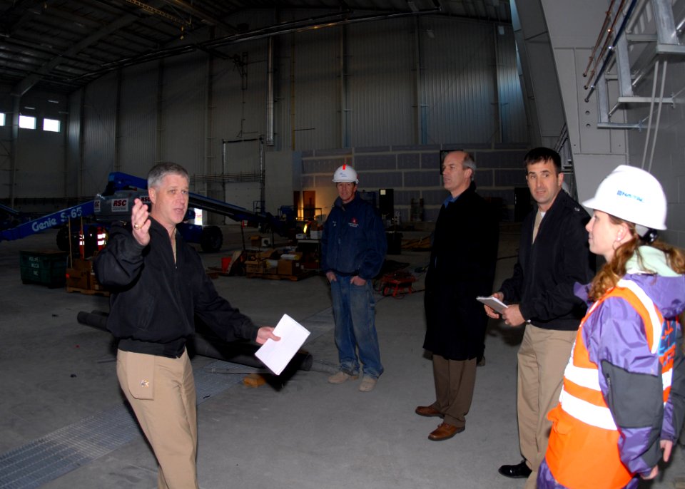 US Navy 091113-N-9860Y-001 Capt. Gerral David escorts U.S. Rep. Rick Larsen on a tour of the installation's indoor wash rack
