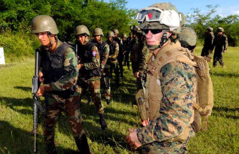 US Navy 091112-N-0890S-180 Sgt. Daniel Newman coaches members of the Dominican Republic military