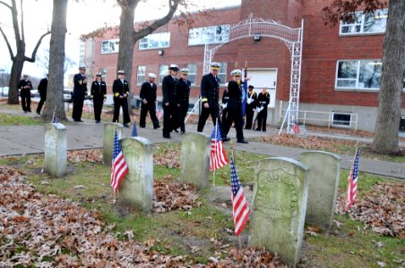 US Navy 091110-N-8848T-418 Rear Adm. Clifford S. Sharpe, left, and Capt. John Malfitano, right, tour the U. S. Naval Cemetery