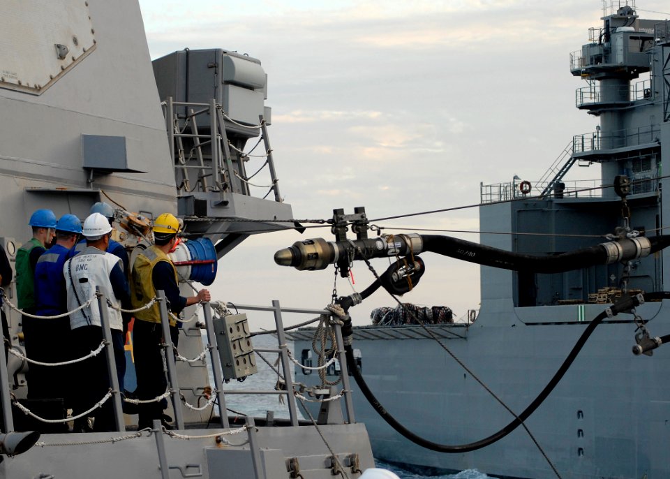 US Navy 091116-N-9520G-080 Sailors assigned to the Arleigh Burke-class guided missile destroyer USS Mustin (DDG 89) stand by as the ship gets ready to receive fuel