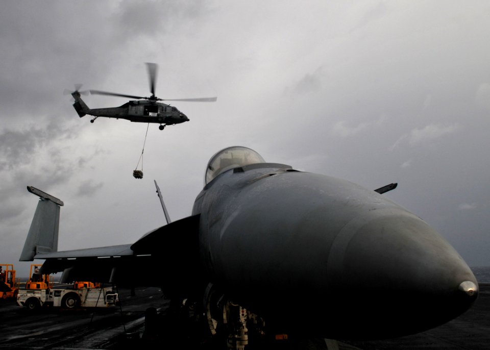 US Navy 091111-N-4236E-258 An MH-60S helicopter participates in a vertical replenishment
