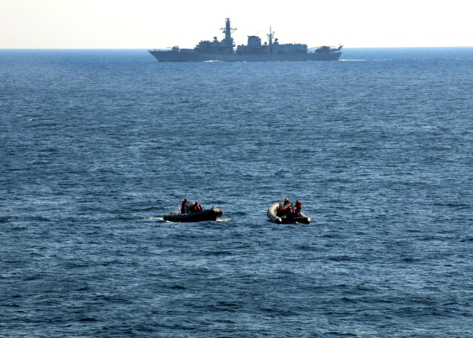 US Navy 091116-N-1291E-196 Members of Helicopter Mine Countermeasures Squadron (HM) 15 wait in rigid hull inflatable boats near the Royal Navy fleet auxiliary service landing ship dock RFA Lyme Bay (L3007)